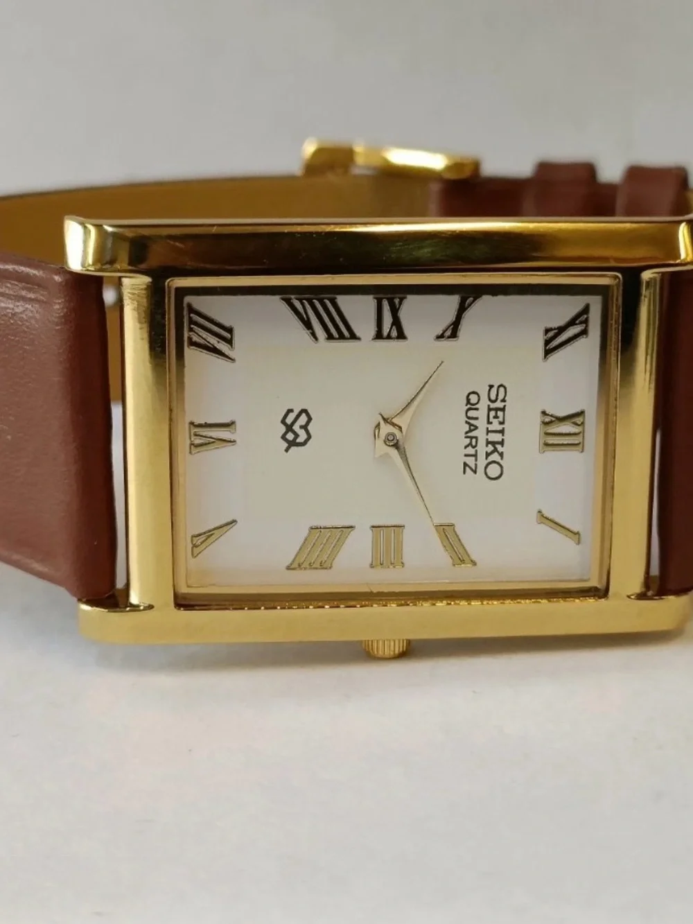 Seiko Gold-Tone Rectangular Watch with Brown Leather Strap and White Dial